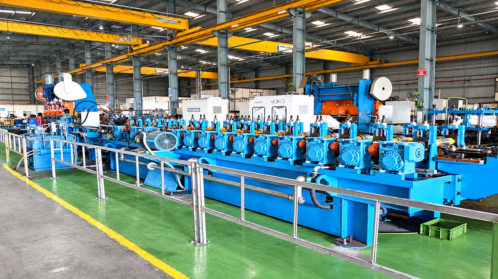 A long blue roll forming line with a row of roller stands